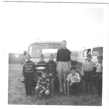 David Thomas with boys and CRI vans